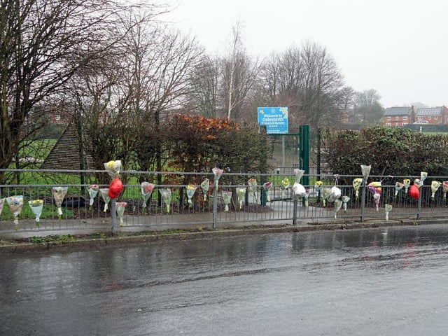 Floral tributes outside Dalestorth Primary School