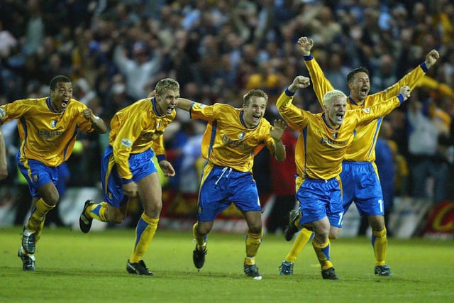 The Mansfield team celebrate after the penalty shoot out.