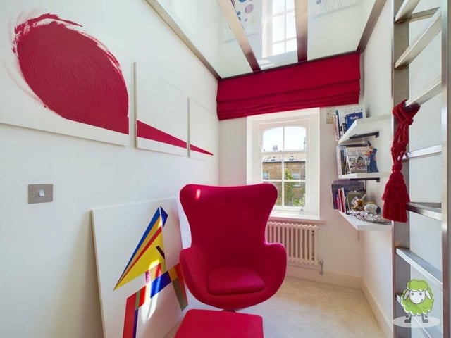 The staircase leads not only to the double bedrooms but also this spacious and versatile study area. Ladders give access to a glass mezzanine.