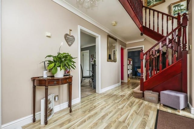 As we prepare to go upstairs, let's pass through the entrance hallway, which immediately makes you feel at home. It features under-stairs storage, Pergo laminate flooring, coving to the ceiling and a dog-leg staircase, with balustrade spindles, that twists its way stylishly to the first floor.