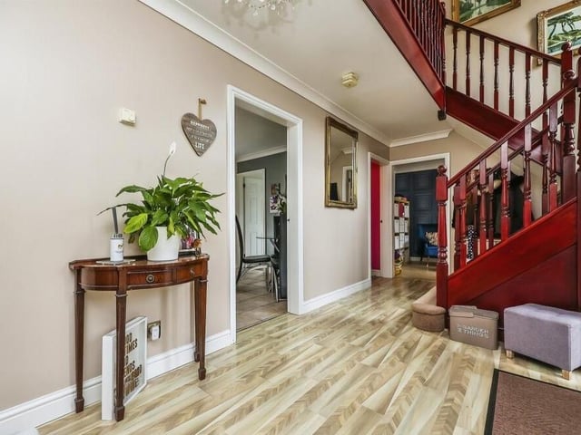 As we prepare to go upstairs, let's pass through the entrance hallway, which immediately makes you feel at home. It features under-stairs storage, Pergo laminate flooring, coving to the ceiling and a dog-leg staircase, with balustrade spindles, that twists its way stylishly to the first floor.