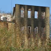 The burned out Hermitage Mill building. Emergency services were called to reports of the fire in Hermitage Lane, Mansfield, at around 3am
