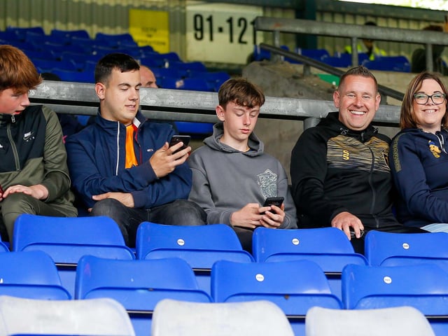 Mansfield Town fans enjoy the 3-0 win at Oldham Athletic.