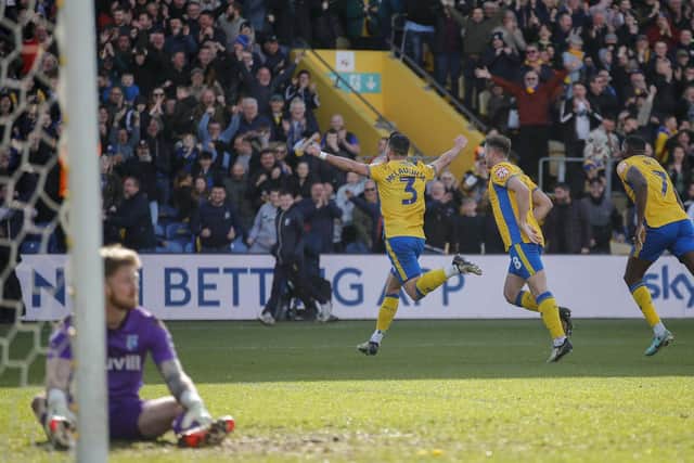 Stephen McLaughlin scores a scorcher during the Sky Bet League 2 match against Gillingham FC at the One Call Stadium on Saturday 20 April 2024.Photo credit Chris& Jeanette Holloway / The Bigger Picture.media