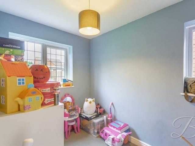 An array of toys give the game away here. Every growing family needs a play room -- and here is the one at Kings Lodge Drive.