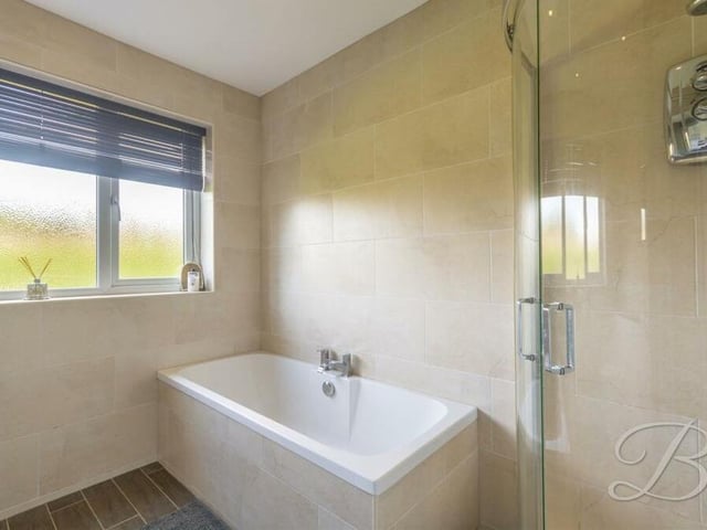 The family bathroom also boasts a bath and enclosed shower.