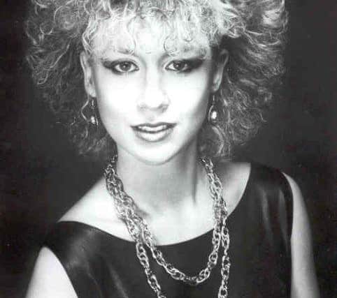 Liz began her singing career in the 1980s.