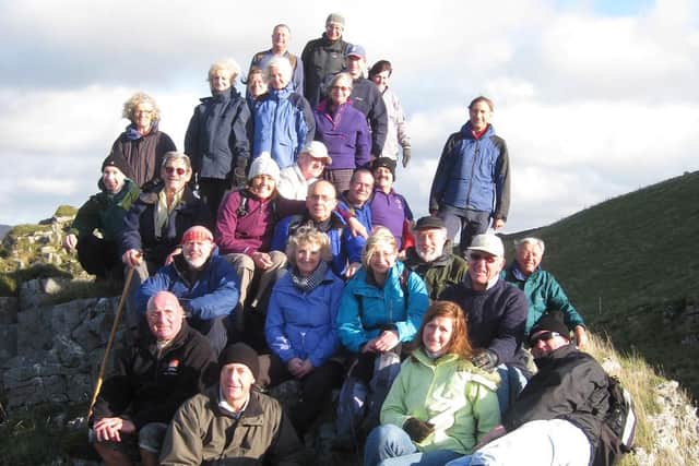 A group of Sutton ramblers on Peter's Stone in the Peak District.