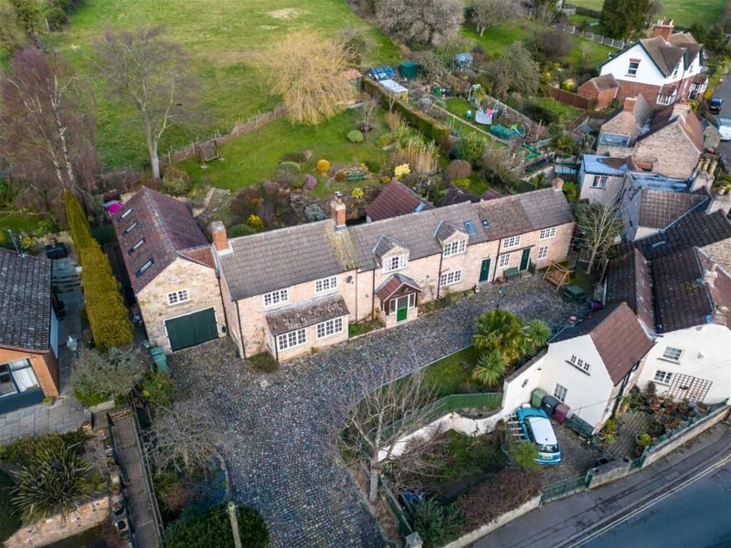 This second aerial shot focuses on the front of the farmhouse and how it fits in with the Whitwell landscape.