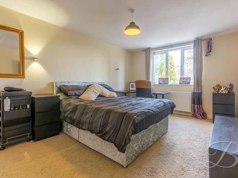 A classic example of a bedroom with oodles of space.