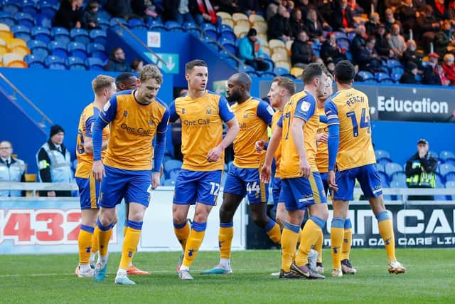 Stags celebrate Davis Keillor-Dunn's early opener. Photo by Chris & Jeanette  Holloway / The Bigger Picture.media