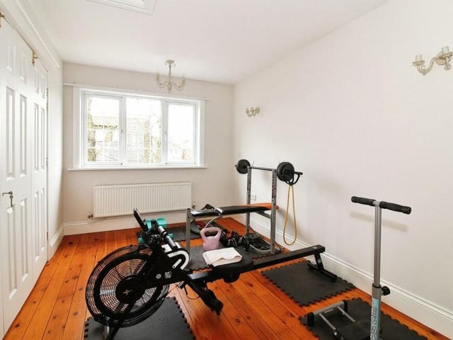 This bedroom has been successfully converted into a mini-gym.