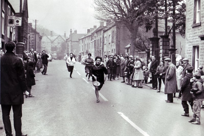 Janet Wright (16) streaks to an easy victory in the ladies open Pancake Race at Winster, Derbyshire February 1967