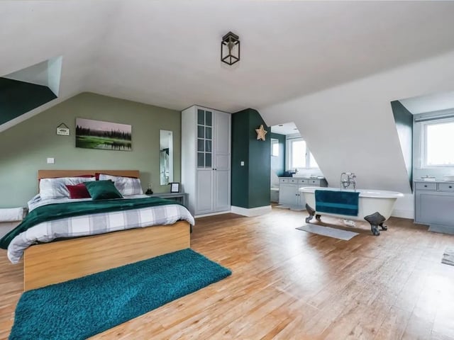 The exceptional master suite features an open bathroom concept.