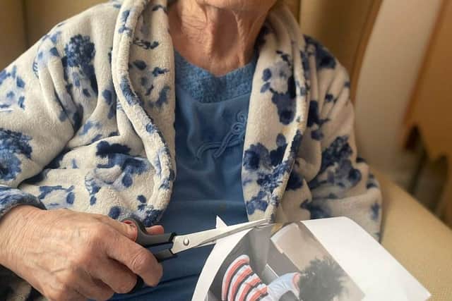 A care home resident helps to create the perfect collection of memories to look back on.