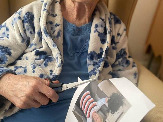 A care home resident helps to create the perfect collection of memories to look back on.