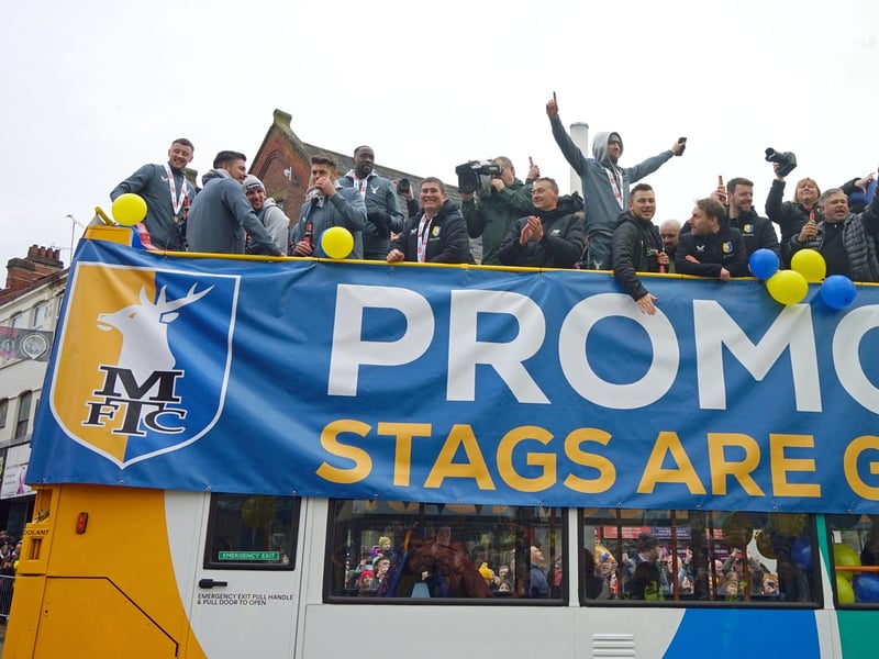 Crowds packed into Mansfield town centre this afternoon to salute their heroes.