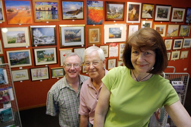 2006: At Brinsley and District Art Group's exhibition at Eastwood Library are Reg Lemon, Eric Wright and Angela Shaw.