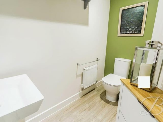 A downstairs toilet is always useful. This one features a wash hand basin and a low-flush WC.