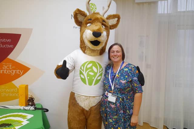 Jo Sanders, Partnerships and Promotions Lead for Nottinghamshire Mind, pictured alongside the Mansfield Building Society mascot.