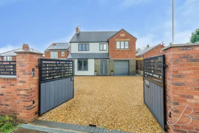 Electric gates welcome you to this five-bedroom, detached home on Jenny Beckett's Lane in Mansfield, which is on the market for £575,000 with estate agents BuckleyBrown.
