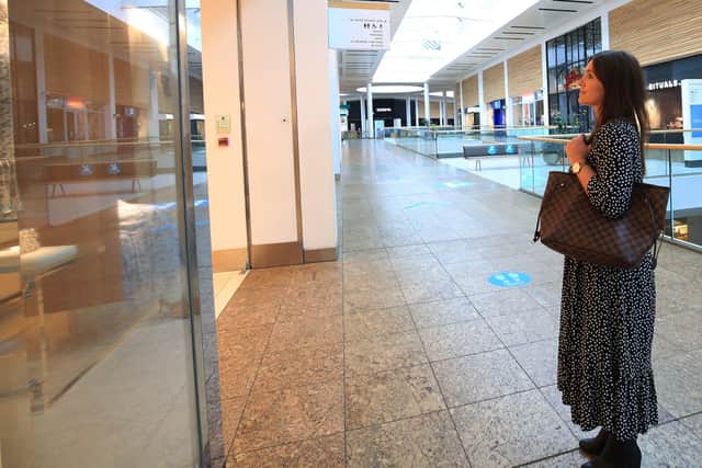 Inside Meadowhall shopping centre. The Laura Ashley store is holding a closing down sale. Picture: Chris Etchells.