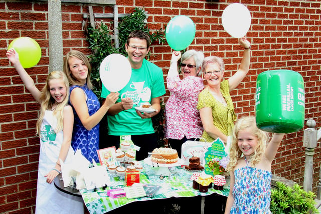 World's Biggest Coffee Morning in 2012 in Eckington with Linda Richardson and her family who host an event each year. Pictured l-r are her daughter 12 year old Rosie richardson, Neice Paula Bestall,  Rob Turner, Macmillan fundraiser for Chesterfield and Sheffield, sister Elaine Nettleship, Linda Richardson, and daughter 9 year old Maisie Richardson.