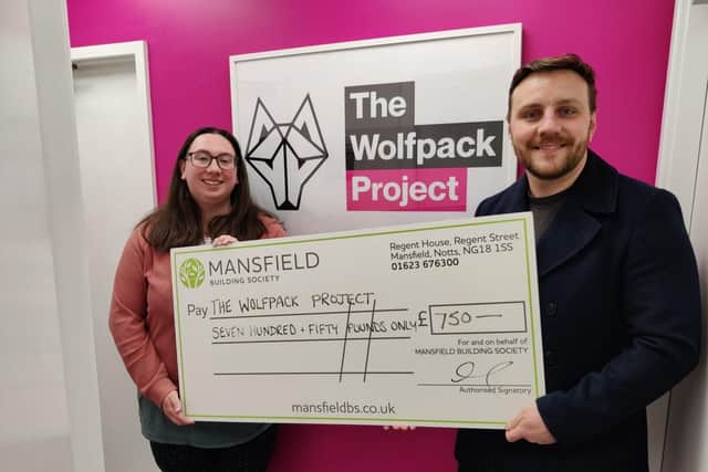Mansfield Building Society’s Senior Product Manager, Joe Dawn, presents donation to The Wolfpack Pro