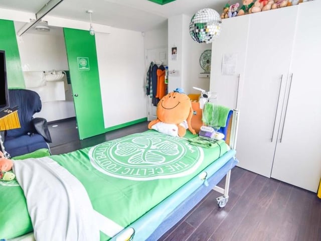 This first bedroom boasts enough space for large wardrobes, not to mention cuddly toys and a glitterball!
