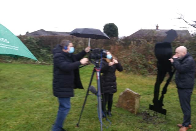 British Forces Broadcasting Service filming at Kings Clipstone - unknown camera man with reporter Kirstie Chambers and Stefan Drew