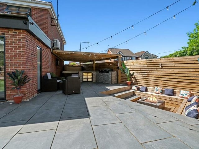 The rear garden is fully landscaped and contains many interesting features. This could be the ideal spot to entertain family and friends.