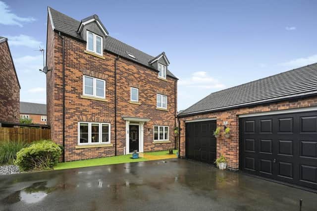 This impressive-looking four-bedroom house on Adams Park Way, Kirkby is expected prove quite a catch, according to estate agents William H,Brown, who are selling for £385,000.
