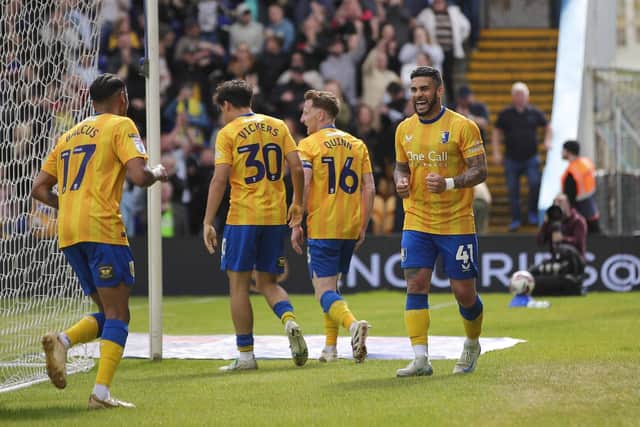 Dom Dwyer celebrates during the Sky Bet League 1 match against Exeter City FC at the One Call Stadium, 03 May 2025, Photo credit Chris & Jeanette Holloway / The Bigger Picture.media