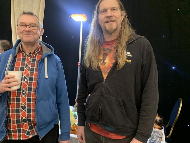 Show volunteer Karl Hernesson (right) and friend enjoying a cup of green tea.