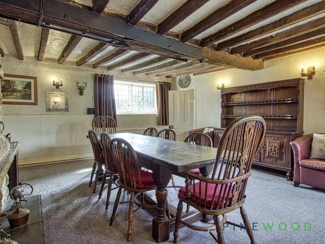 At the heart of the property is the formal dining room, an ideal entertaining space complete with a captivating open fire