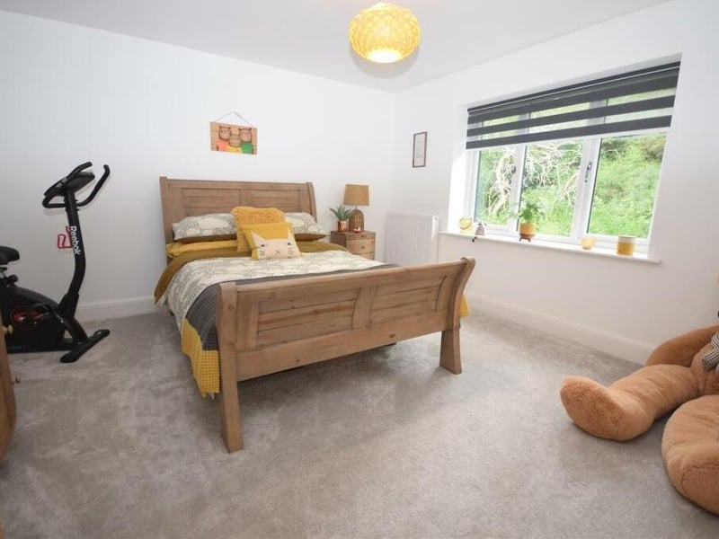 The fourth double bedroom, which faces the rear of the house, is big teddy's favourite!