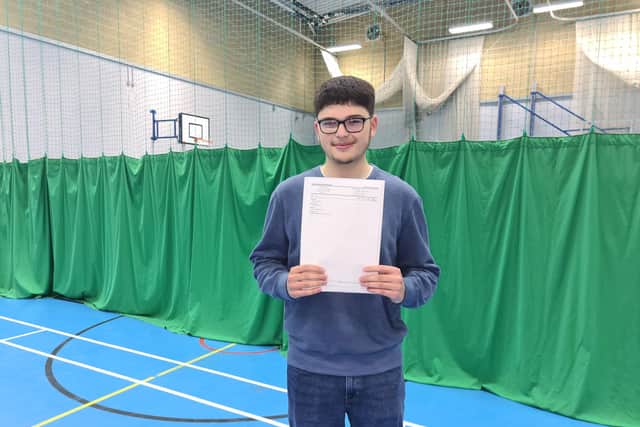 Nathan Cooke with his exam results