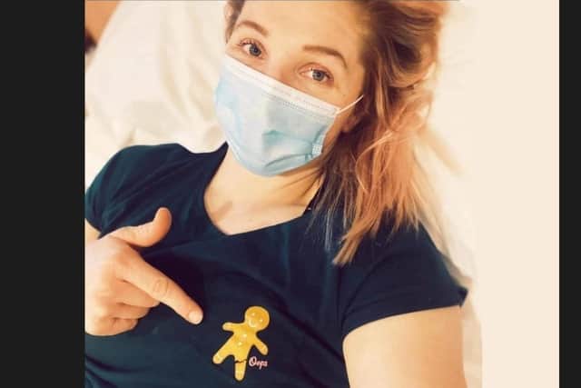 Charlotte recuperating in hospital after surgery - entertaining the nurses with her choice of pyjamas.