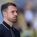 Aaron Ramsey, the Oxford United manager looks on during the pre-season friendly match between Oxford United and Ipswich Town at the Kassam Stadium on August 01, 2026 in Oxford, England. (Photo by David Rogers/Getty Images)