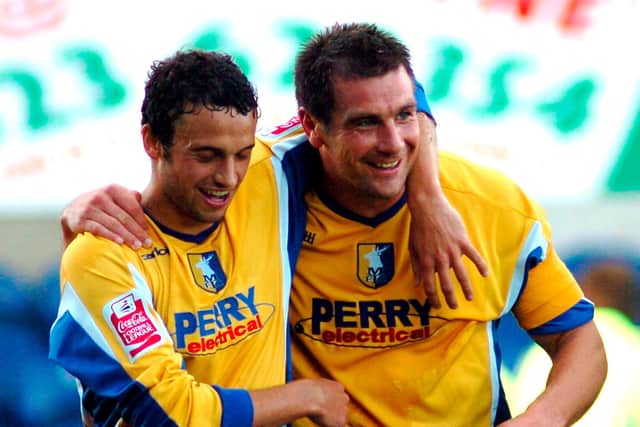 Richie Barker celebrates his second goal against Wrexham with Gareth Jelleyman. Picture by Dan Westwell.