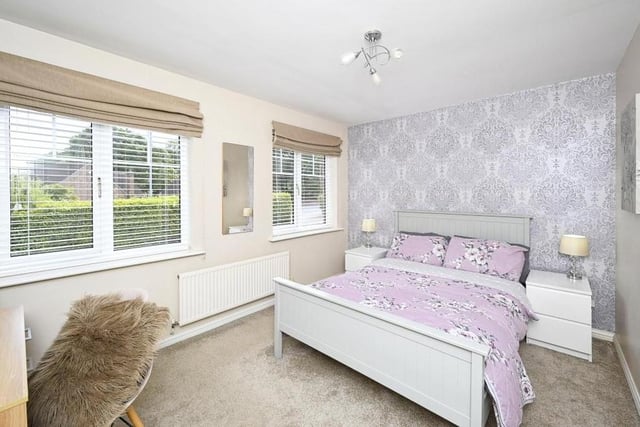 Bedroom number two, which overlooks the front of the property, is bright and light.