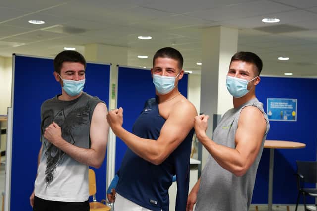 Brothers Ben, Mikey and Joe Fleet-Chapman at King’s Mill Hospital’s Vaccination Hub. Photo Sherwood Forest Hospitals