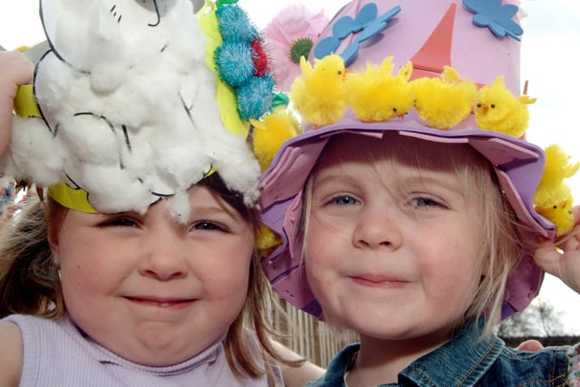 Katie Bowers and Evie Withers held onto their hats on a very windy Easter bonnet parade at Rocking Horse Nursery in Kirkby.