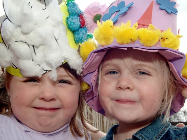 Katie Bowers and Evie Withers held onto their hats on a very windy Easter bonnet parade at Rocking Horse Nursery in Kirkby.