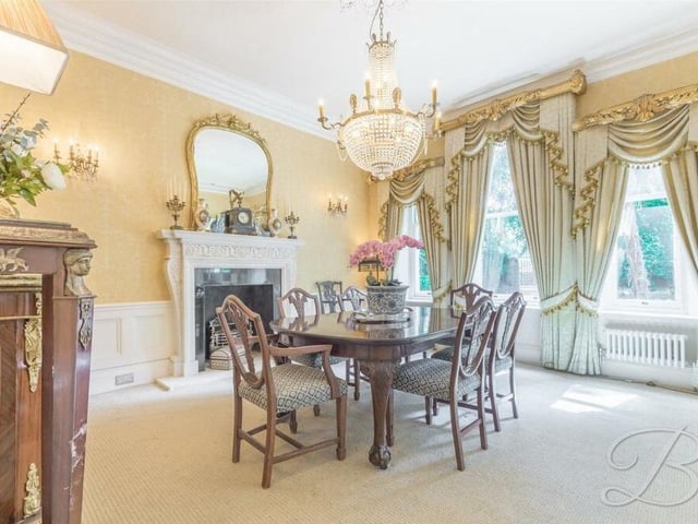 The dining room is the epitome of elegance, with its feature fireplace, fitted carpets and three windows overlooking the front of the house. Here you can enjoy sit-down meals with the family or entertain guests.