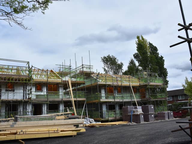 The new homes are being built with timber frames and low carbon heat sources