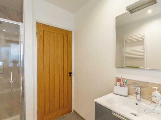The smart family bathroom at the Lansdowne Avenue bungalow also comes with an enclosed shower.
