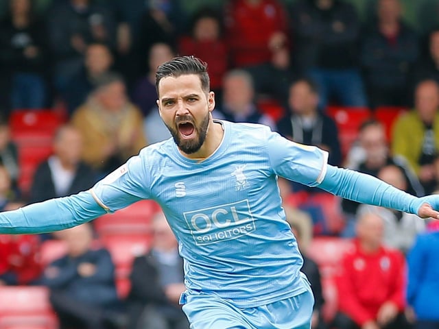Stephen McLaughlin nets away at Salford City.