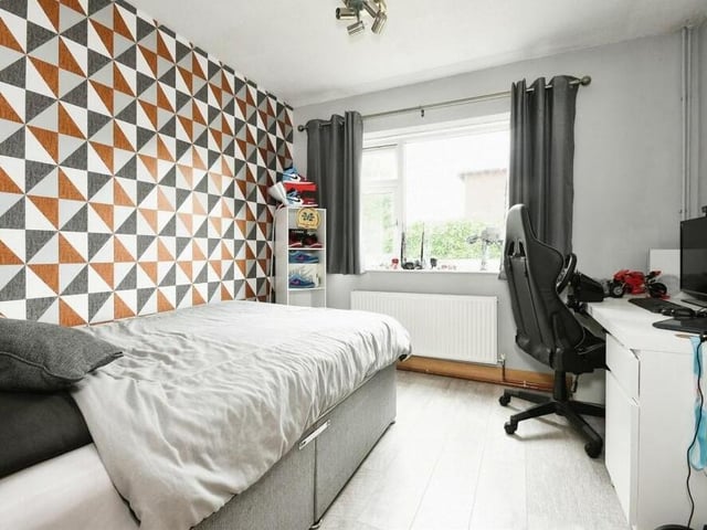 The annexe features its own lounge, kitchen, shower room and this bedroom, which has space for a desk.