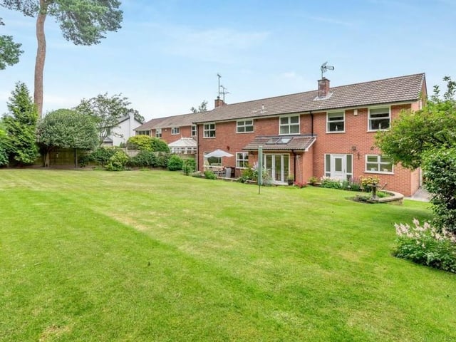 Let's step outside now for a few exterior shots of the impressive Black Scotch Lane property. This a shot of the back of the house from the sizeable rear garden.